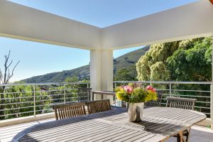 a balcony and garden views.||Set in Cape Town