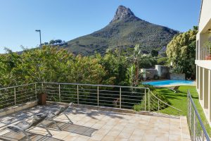 a balcony and garden views.||Set in Cape Town