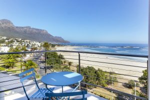 1760-Modoco-Beach-Holiday-apartment-Cape-Town-outside-table-