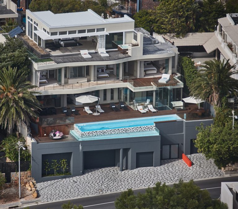 1_aerial_view_villa_dolce_vita||Dolce vita Camps Bay sun deck and pool||Dolce vita Camps Bay sun lounger||Dolce vita Camps Bay main bedroom||Dolce vita Camps Bay staircase||Dolce vita Camps Bay lower lounge area||Dolce vita Camps Bay main at night||Dolce vita Camps Bay lounge||Dolce vita Camps Bay lift and sea views||Dolce vita Camps Bay living area||Dolce vita Camps Bay exterior||Dolce vita Camps Bay kitchen||Dolce vita Camps Bay dining table||Dolce vita Camps Bay exterior||Dolce vita Camps Bay dining||Dolce vita Camps Bay bedroom 3||Dolce vita Camps Bay deck and pool||Dolce vita Camps Bay bathtube||Dolce vita Camps Bay bathroom||Dolce vita Camps Bay bathroom 2||Dolce vita Camps Bay balcony||Dolce vita Camps Bay 2nd bedroom||8_downstairs_lounge_leading_onto_14m_pool_and_deck||11_glass_lift_entrance_to_villa||10_outdoor_eating_1||2_outdoor_living_1||3_outdoor_living_2||4_penthouse_suite_1||5_penthouse_suite_3||7_all_weather_ocean_facing_braai_area_2