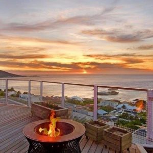 a four-bedroom luxury rental villa with ocean & mountain views in Cape Town.||Rent 13 Sunset Avenue