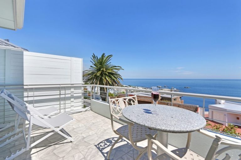 indigo-bay-the-penguin-indigo-bay-the-penguin-seating-on-balcony-81564596-960x640-1