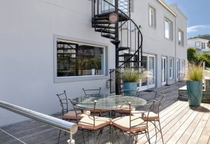 Spiral staircase to the sundowner patio - Plett accommodation