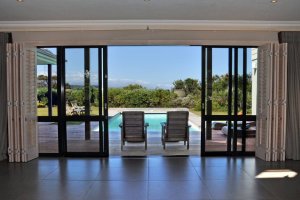 View from entrance hall looking onto the pool - plett villas