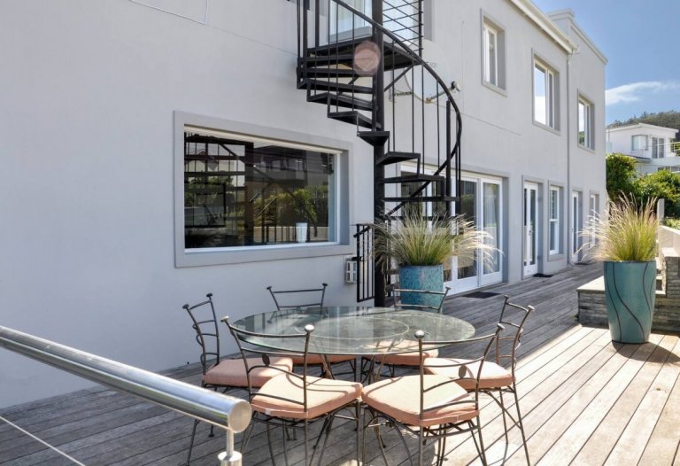 stiarcase from upstairs patio to downstairs