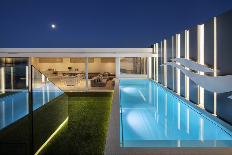 Penthouse In Mouille Point - 5 Star Accommodation pool at night