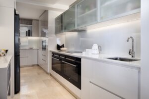 Penthouse In Mouille Point - 5 Star Accommodation scullery]