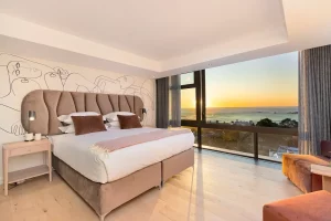 Bedroom 8 (B) King size bed (Extra length) with Ocean View- Wake up to the sound of the ocean in the contemporary designed bedrooms