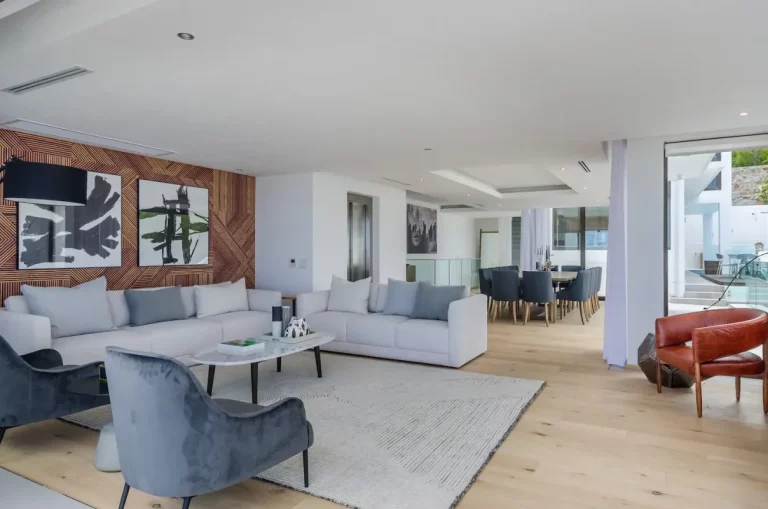 Living Room (A)- Lots of natural daylight and stunning views in the living room. The elegant styling and decor gives a comfortable, spacious and homely feel to the villa
