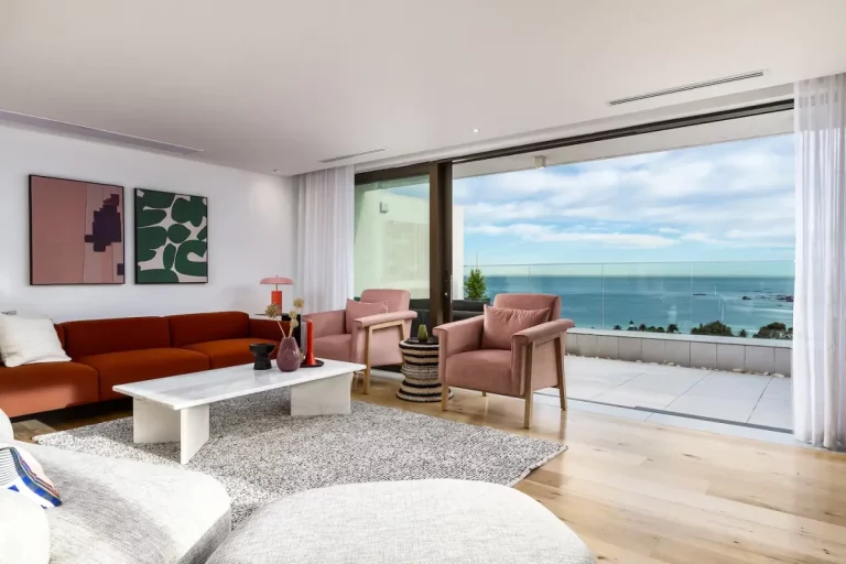 Living Room (B) with Sea View- Stunning ocean views can be seen from the living room which leads onto a large patio area