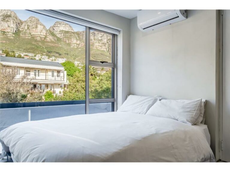 azzura-bedroom-inviting-ambience-mountanious-backdrop