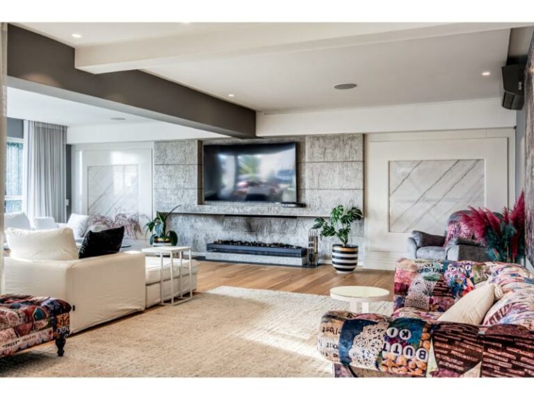 azzura-living-space-stylish-couch-floor-overlaid-with-a-carpet