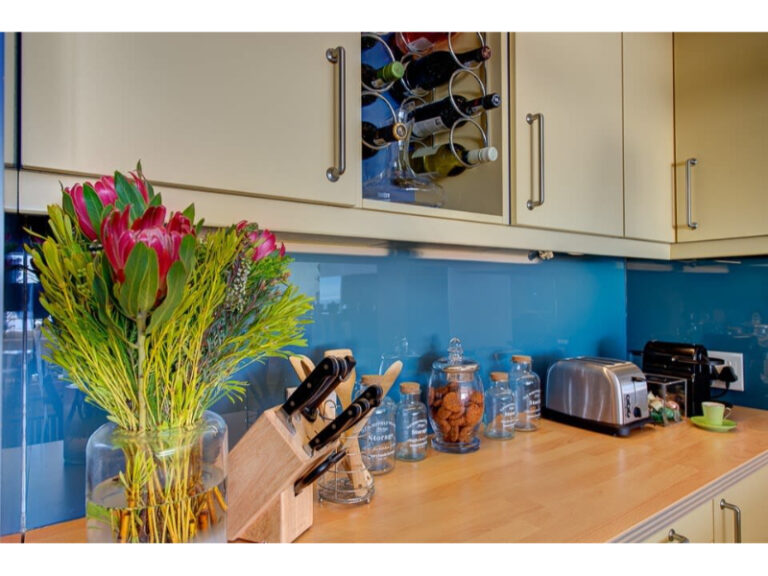 cape-alllure-kitchen-area-equipped-with-a-wine-rack