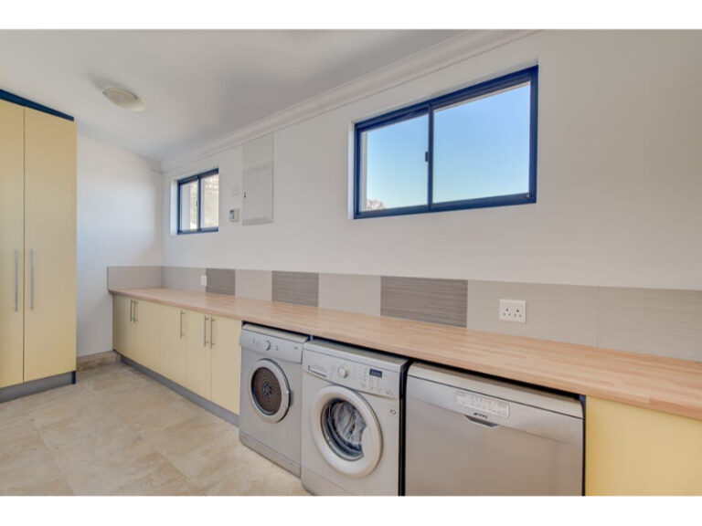cape-allure-spacious-laundry-room-with-etra-storage-spac